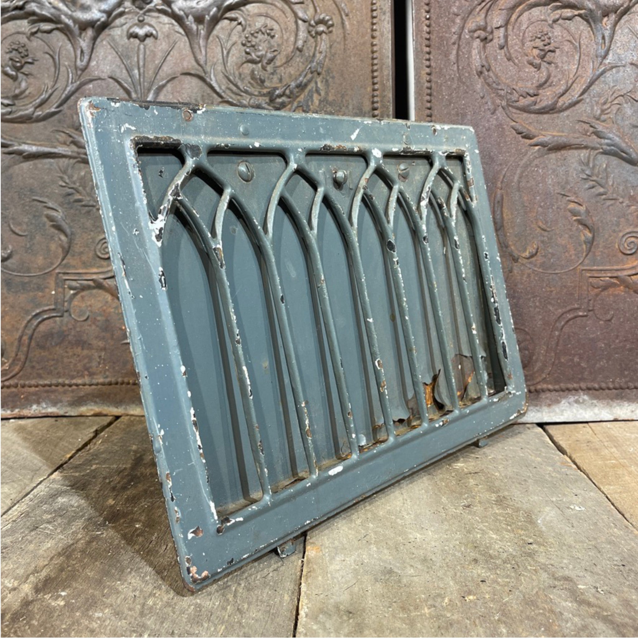 Iron Stamped Wall Register with Cathedral Design