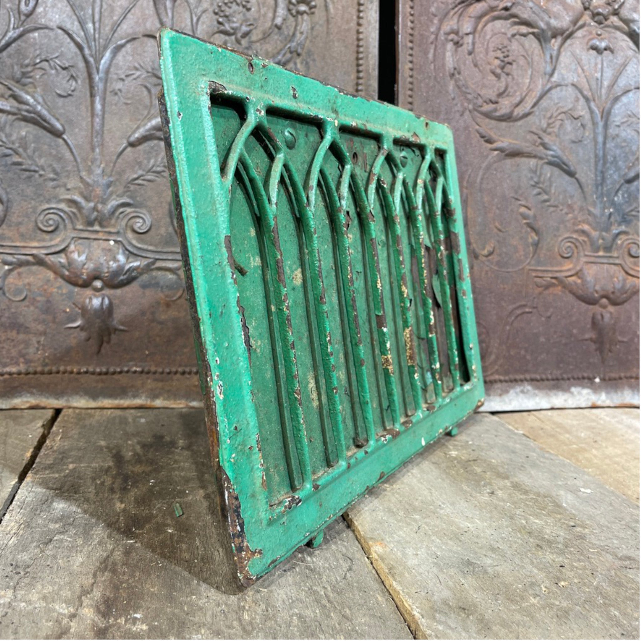 Iron Stamped Wall Register with Cathedral Design