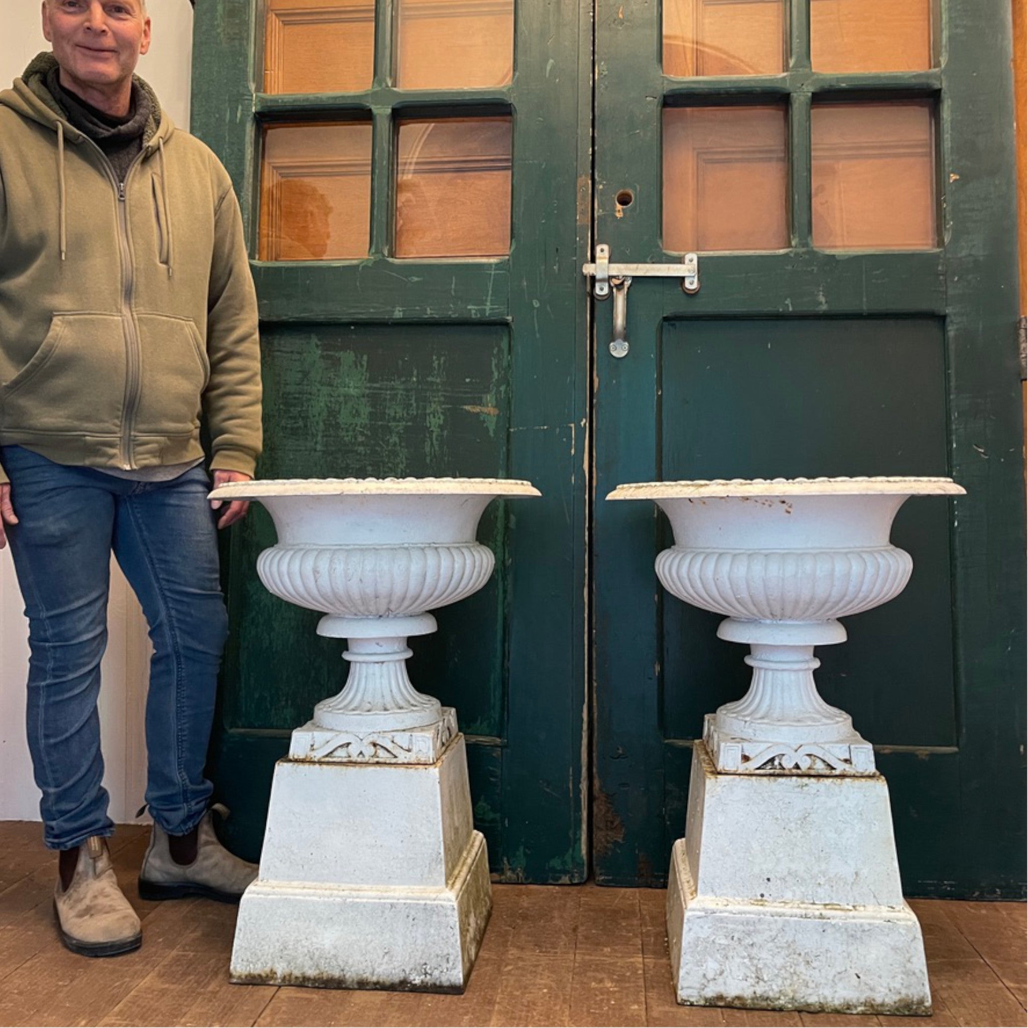 Pair of Cast Iron Campana Urns on Plinths, Vintage Patina