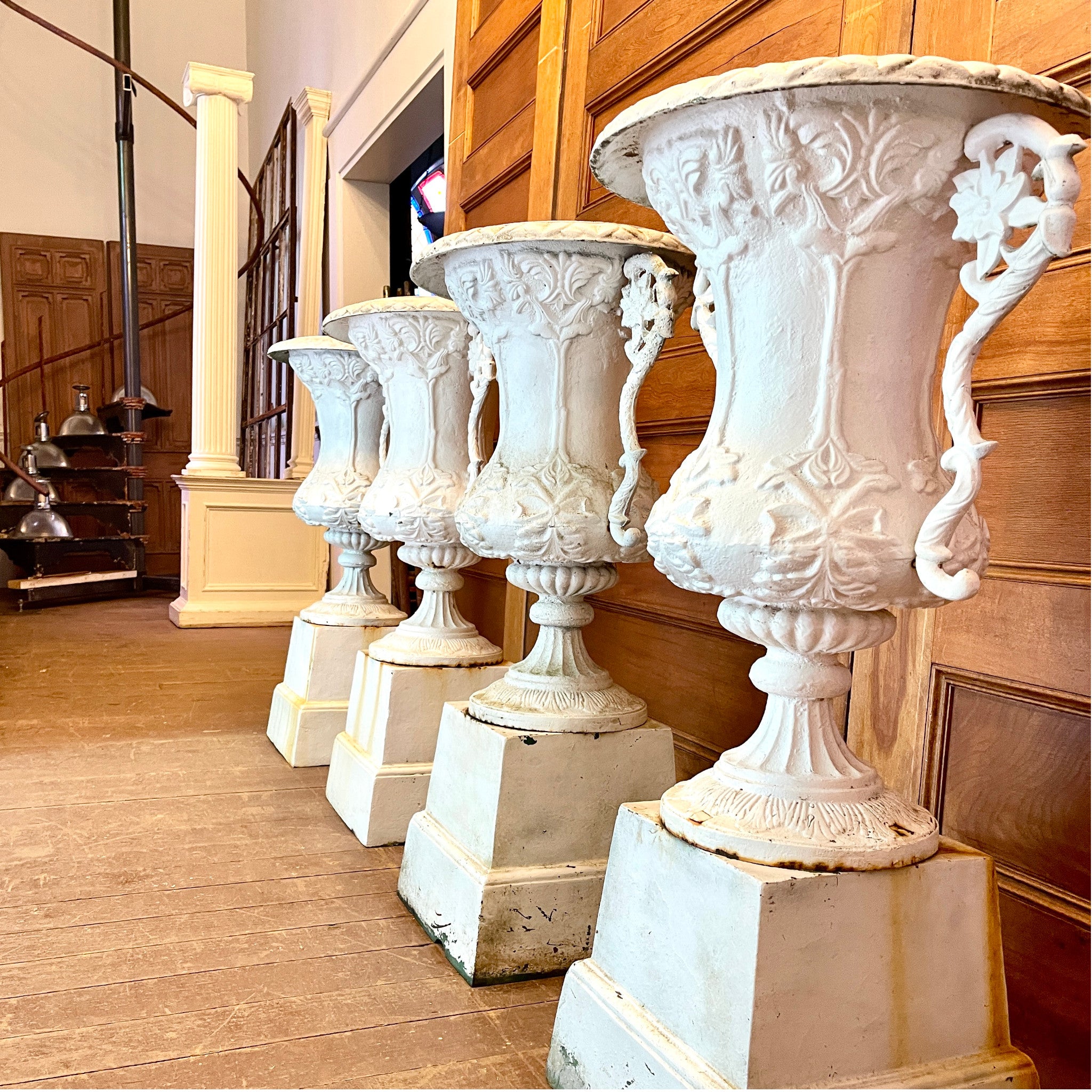 Set of Four Cast Iron Garden Urns with Matching Plinths — Art Nouveau Influence