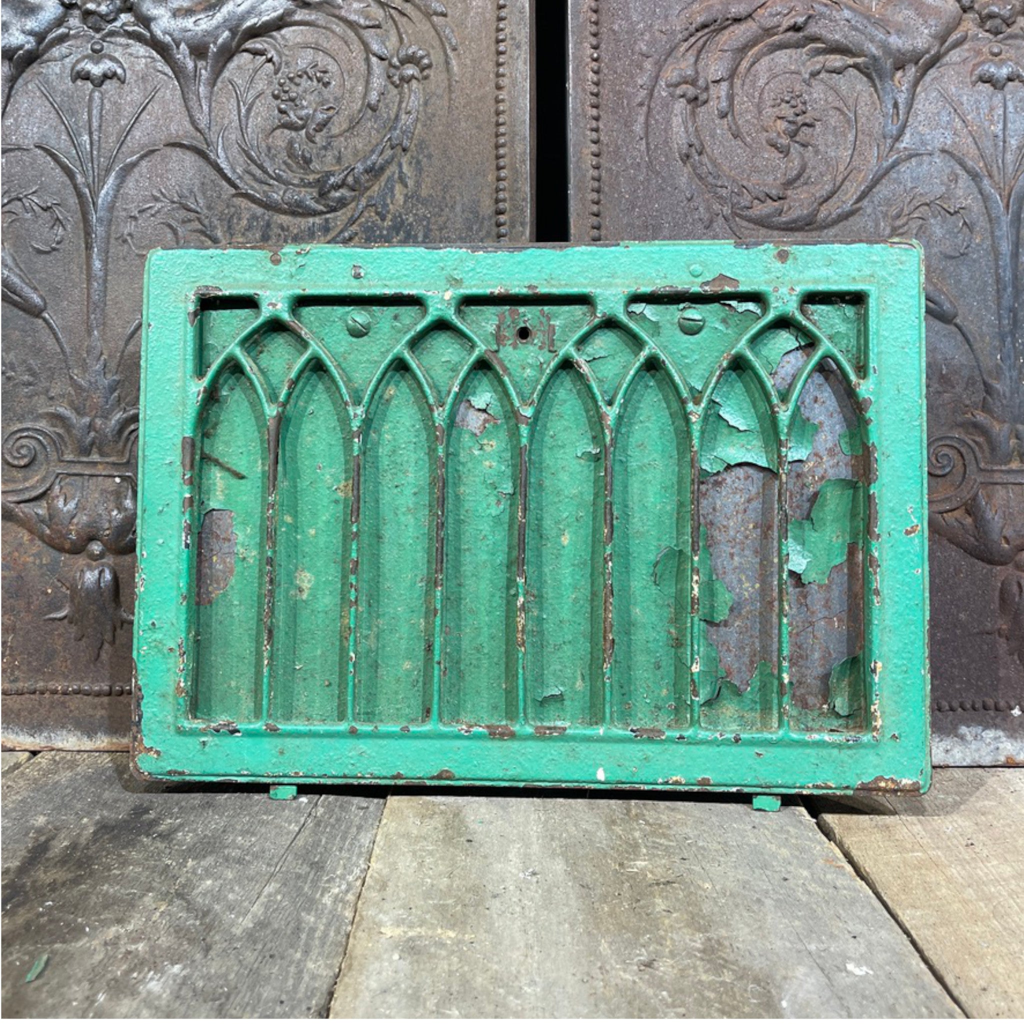 Iron Stamped Wall Register with Cathedral Design