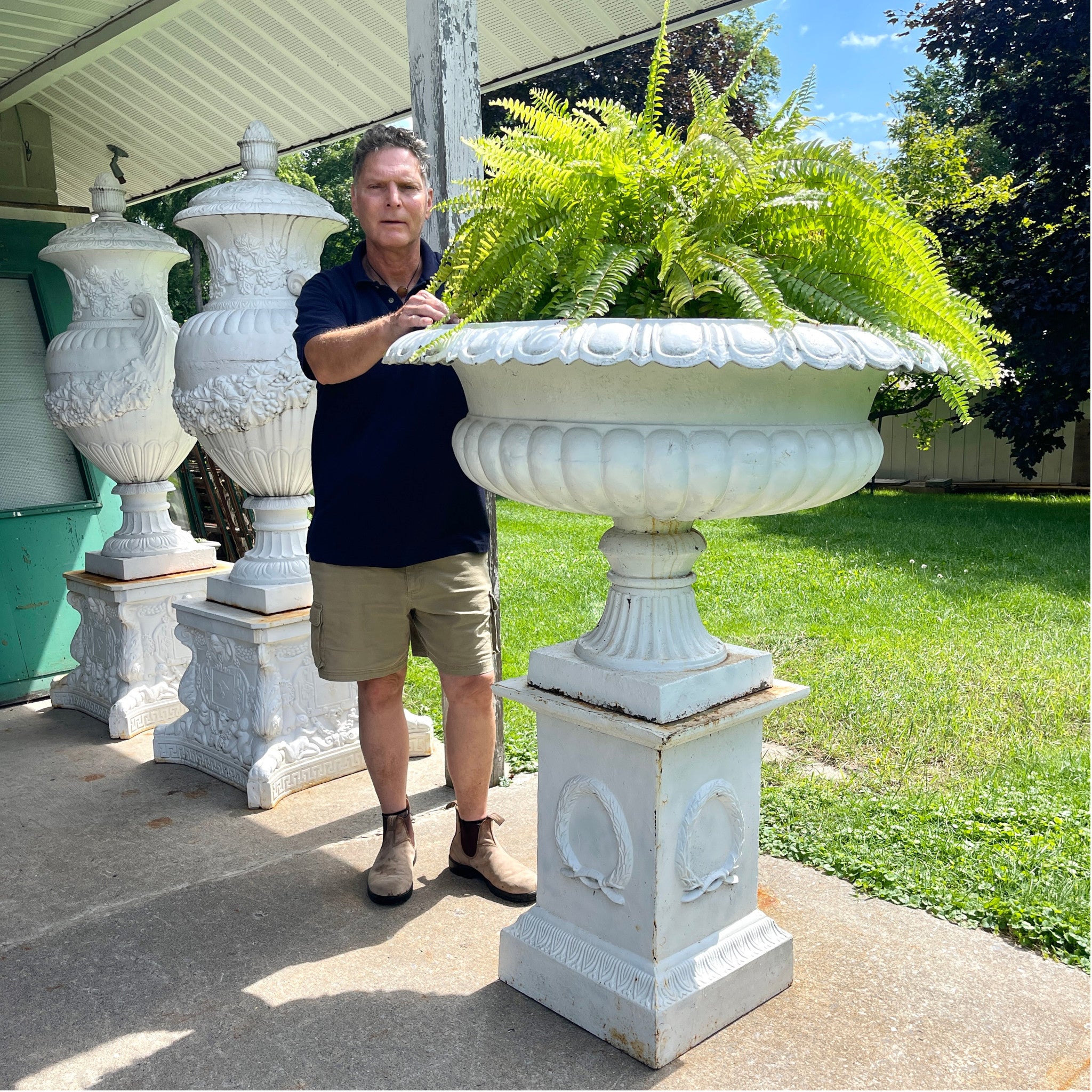 Oversized Cast Iron Garden Urn on Laurel Plinth, 42" Diameter, 53" H
